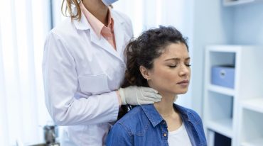 endocrinologist-examining-throat-young-woman-clinic-women-with-thyroid-gland-test-endocrinology-hormones-treatment-inflammation-sore-throat