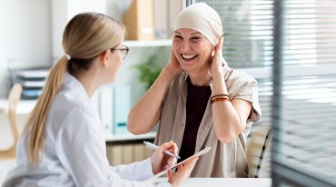woman-with-skin-cancer-talking-with-doctor